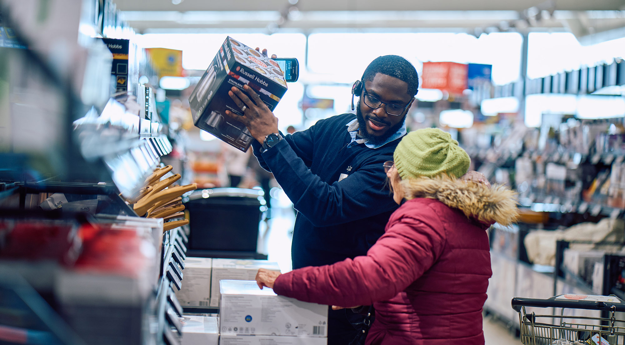 Lidl staff and customer